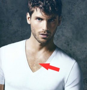 male with white v-neck and exposed chest hair