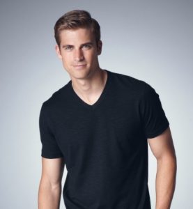 young male wearing black v-neck
